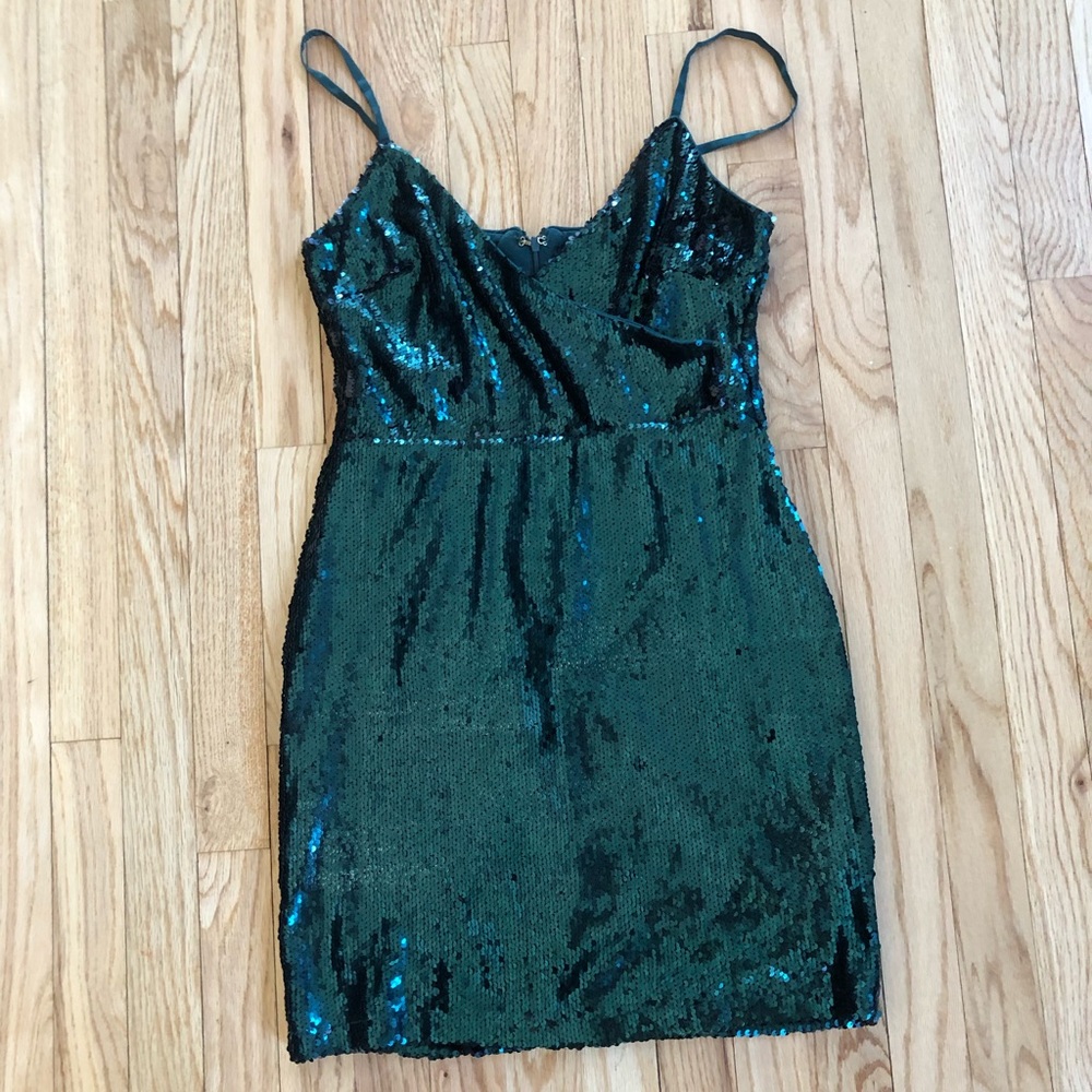 Emerald green sequin mini dress.